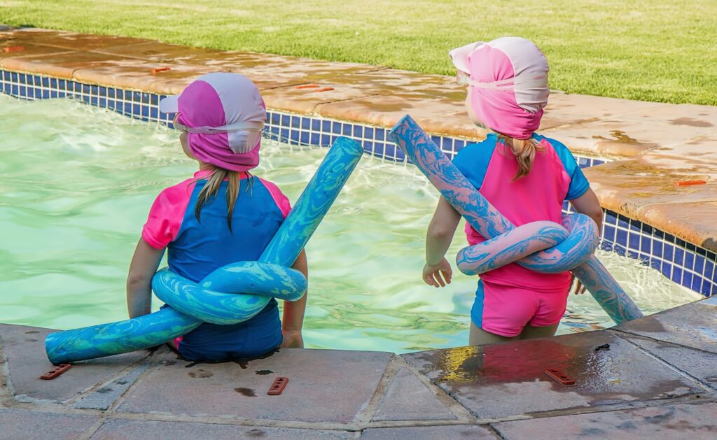 Children entering swimming pool