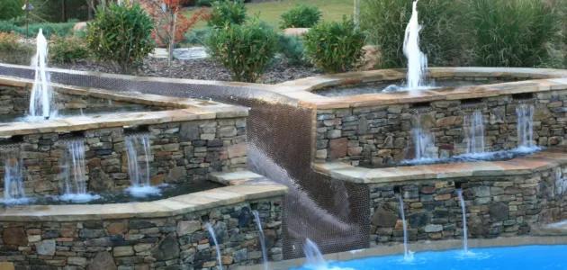 a water feature made up of waterfalls, fountains and water slides